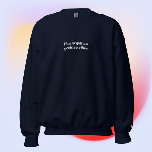 "film negatives, positive vibes" Embroidered Crewneck